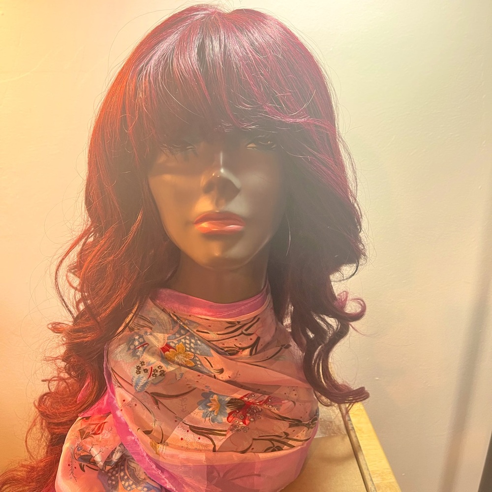 Sensational Swiss lace wig.  22”. Color: Burgundy